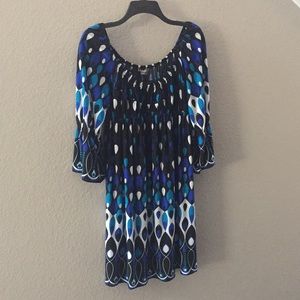 Dresses and suits all from Dillard’s